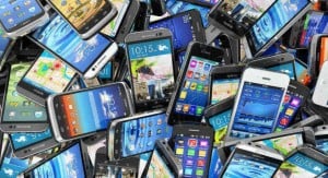 pile of used smartphones